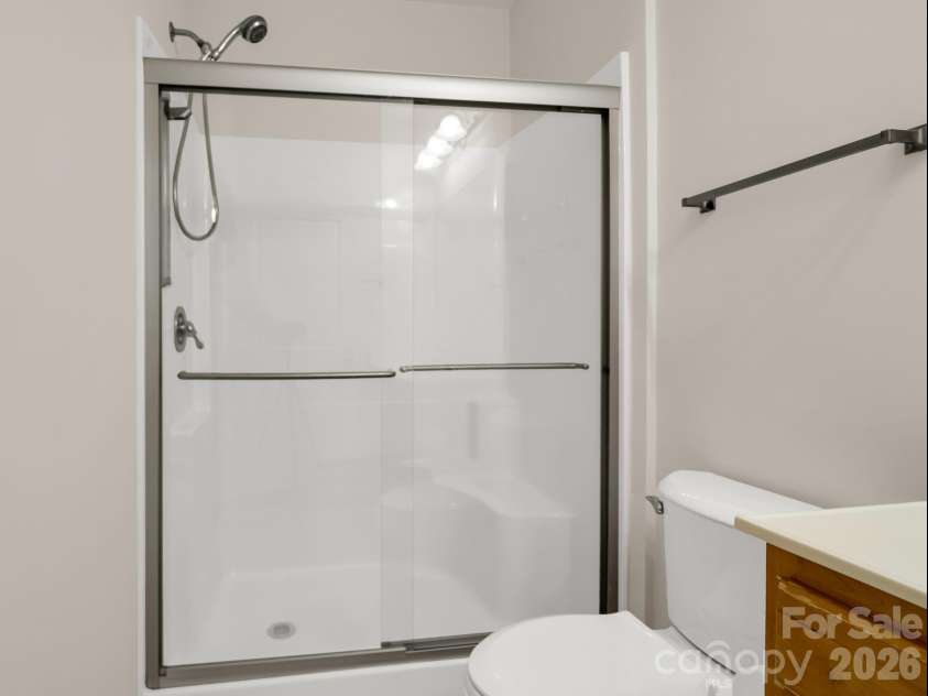 181 Brickton Village Circle, Fletcher, NC 28732.  MLS# CAR4351258, YatesRealty ID 6764. Low step primary shower
