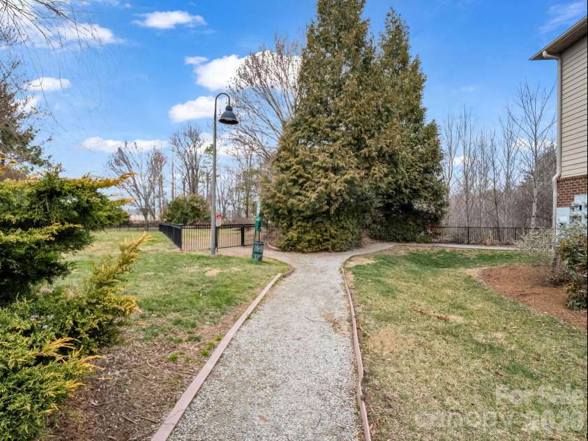 181 Brickton Village Circle, Fletcher, NC 28732.  MLS# CAR4351258, YatesRealty ID 6764. This way to disc golf
