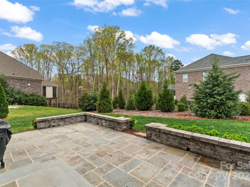 400 Eden Hollow Lane, Weddington, NC 28104.  MLS# CAR4243041, YatesRealty ID 6765. Large stone patio for cookouts