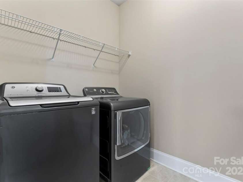 400 Eden Hollow Lane, Weddington, NC 28104.  MLS# CAR4243041, YatesRealty ID 6765. Laundry room upstairs