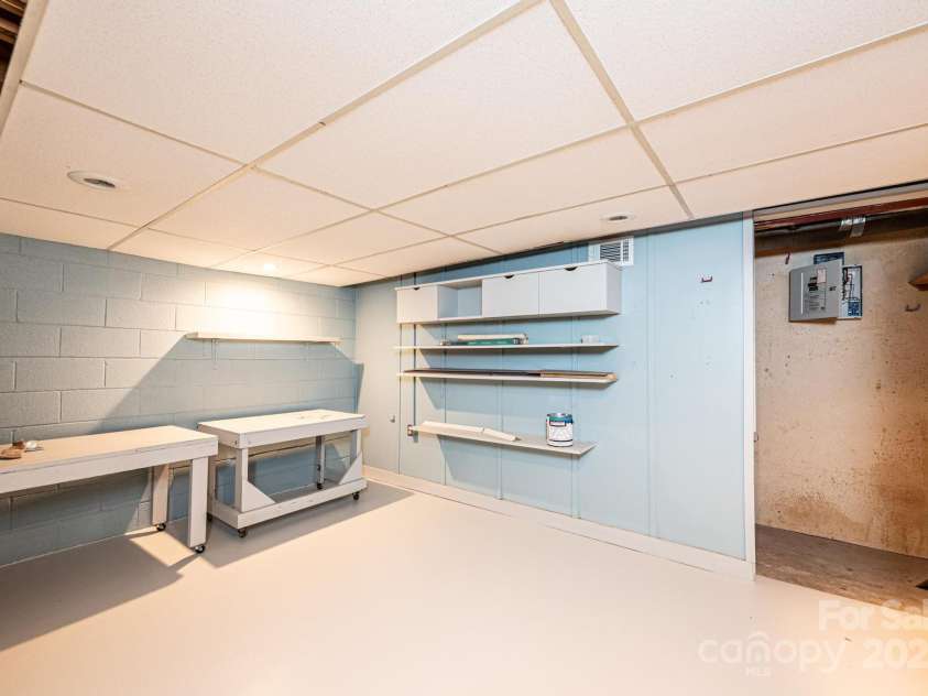 141 36th Avenue, Hickory, NC 28601.  MLS# CAR4317550, YatesRealty ID 677. Craft/Art Room on lower level