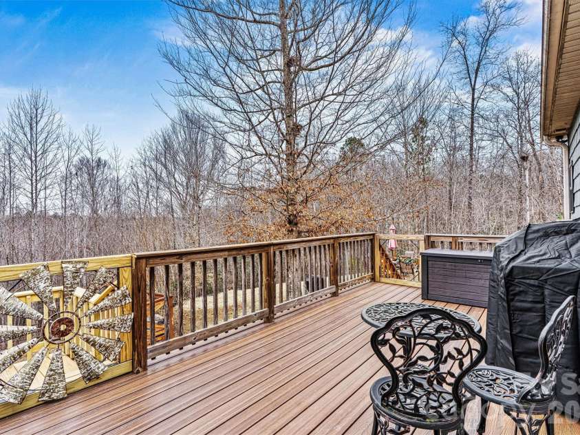 3108 Arden Way, Claremont, NC 28610.  MLS# CAR4352578, YatesRealty ID 6770. Back Deck/Wooded Area View 