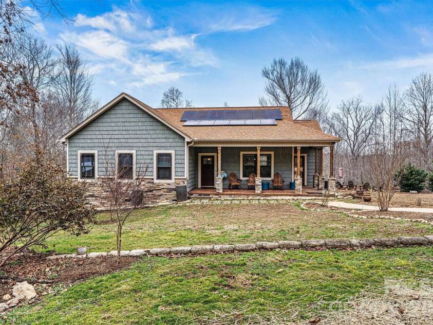 3108 Arden Way, Claremont, NC 28610.  MLS# CAR4352578, YatesRealty ID 6770. Focused Front/Solar Panel View 