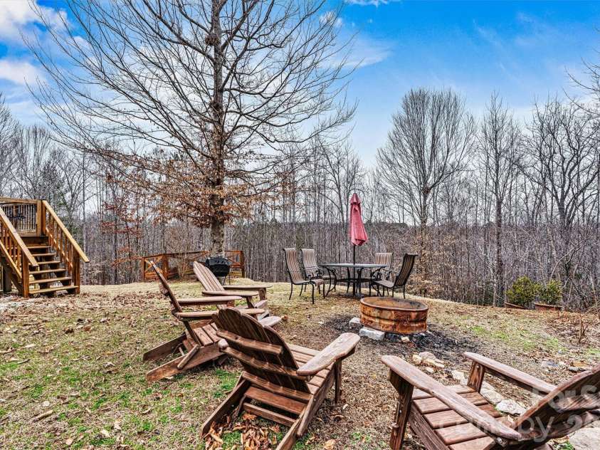 3108 Arden Way, Claremont, NC 28610.  MLS# CAR4352578, YatesRealty ID 6770. Side Yard/Wooded Back Yard View 