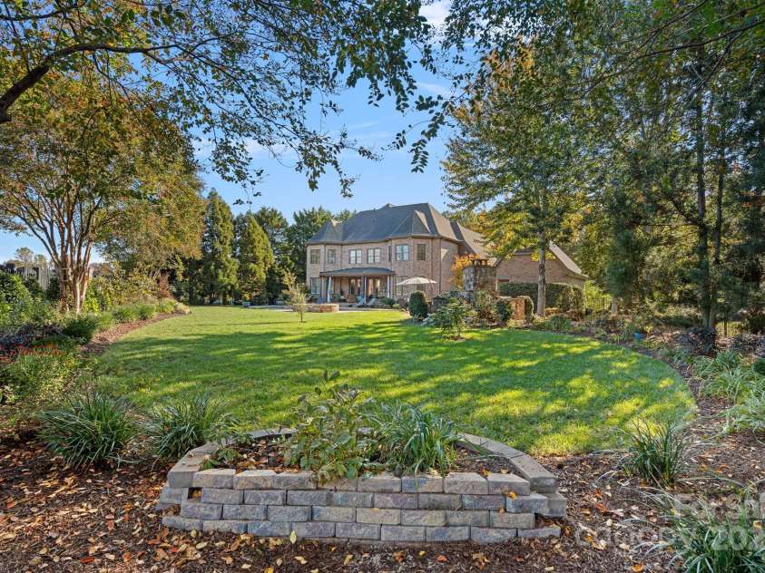 8724 Highgrove Street, Charlotte, NC 28277.  MLS# CAR4232220, YatesRealty ID 6777. Beautiful mature lawn and gardens
