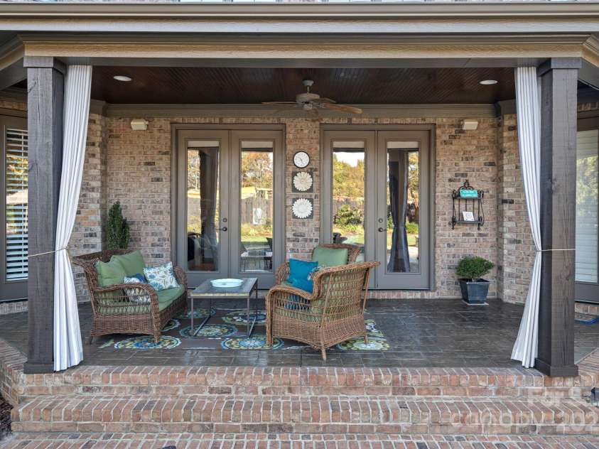 8724 Highgrove Street, Charlotte, NC 28277.  MLS# CAR4232220, YatesRealty ID 6777. Covered back patio