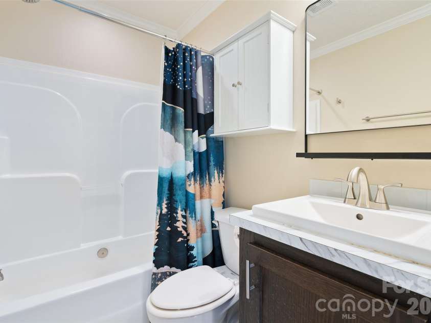 105 Stormy Way, Waynesville, NC 28785.  MLS# CAR4360407, YatesRealty ID 6780. Hallway bathroom