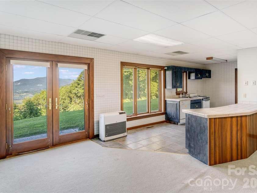 1087 Brigadoon Drive, Clyde, NC 28721.  MLS# CAR4362911, YatesRealty ID 6781. 2nd kitchen on lower level