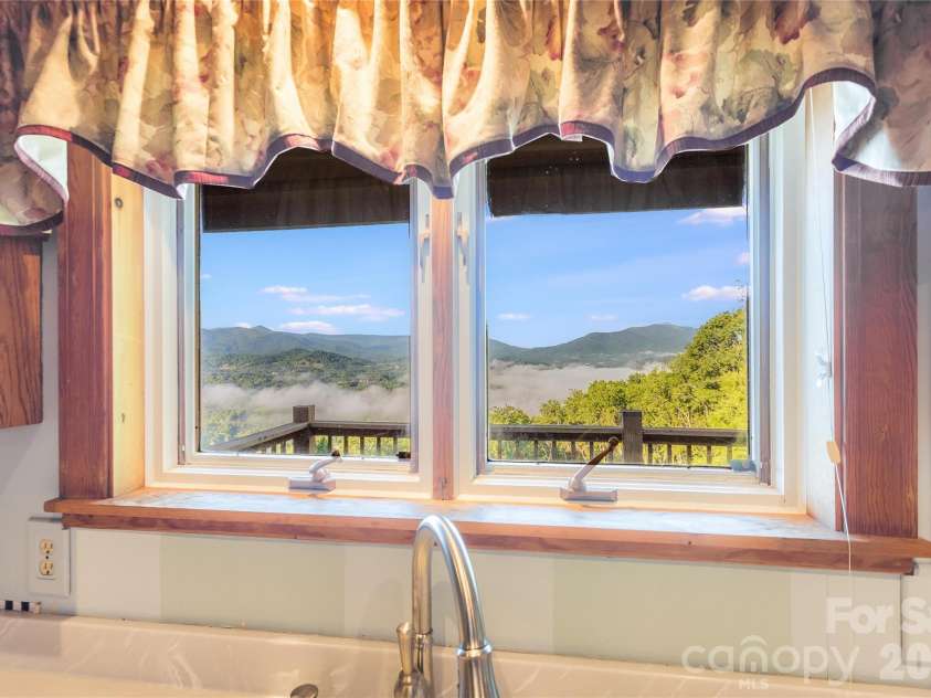 1087 Brigadoon Drive, Clyde, NC 28721.  MLS# CAR4362911, YatesRealty ID 6781. Amazing view