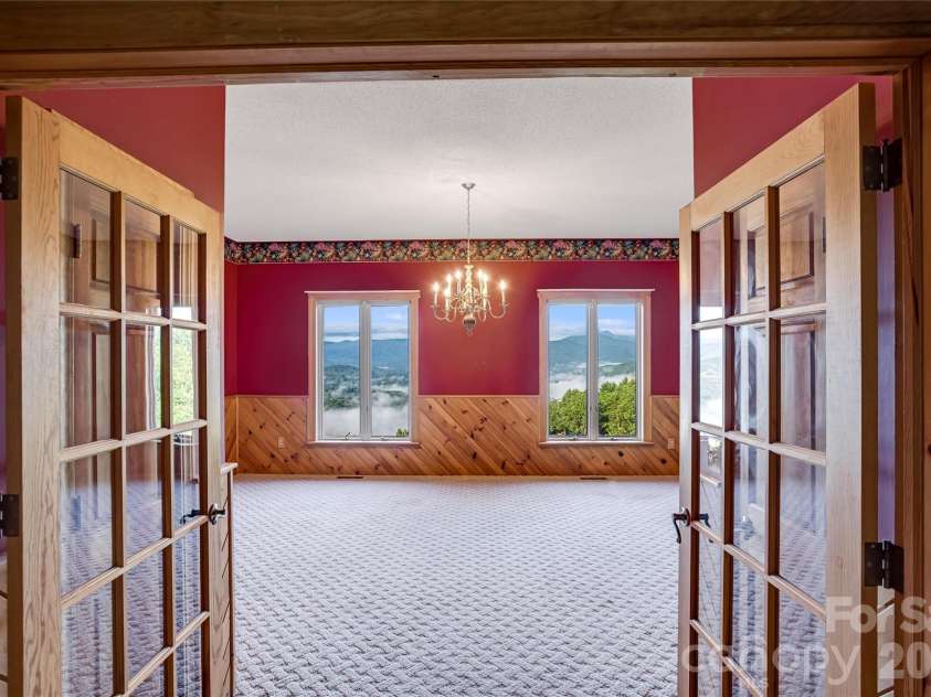 1087 Brigadoon Drive, Clyde, NC 28721.  MLS# CAR4362911, YatesRealty ID 6781. Dining room with amazing views