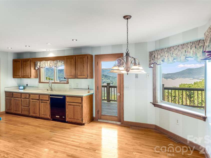 1087 Brigadoon Drive, Clyde, NC 28721.  MLS# CAR4362911, YatesRealty ID 6781. Views from every room