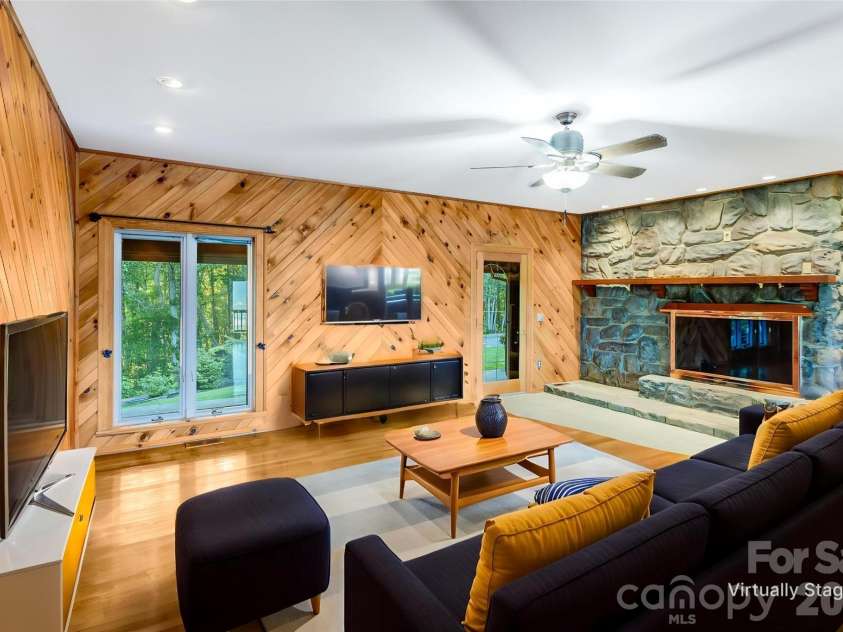 1087 Brigadoon Drive, Clyde, NC 28721.  MLS# CAR4362911, YatesRealty ID 6781. Virtually staged den