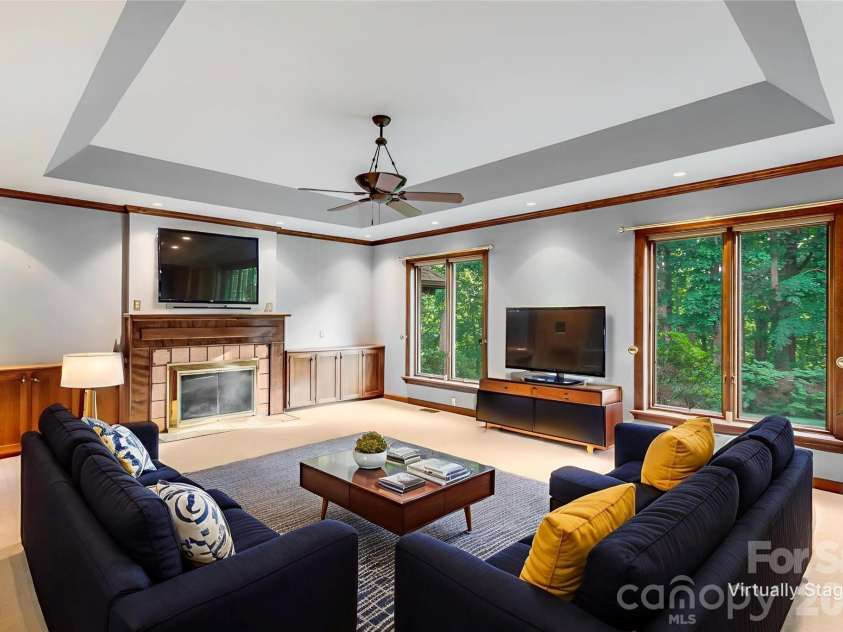 1087 Brigadoon Drive, Clyde, NC 28721.  MLS# CAR4362911, YatesRealty ID 6781. Virtually staged library