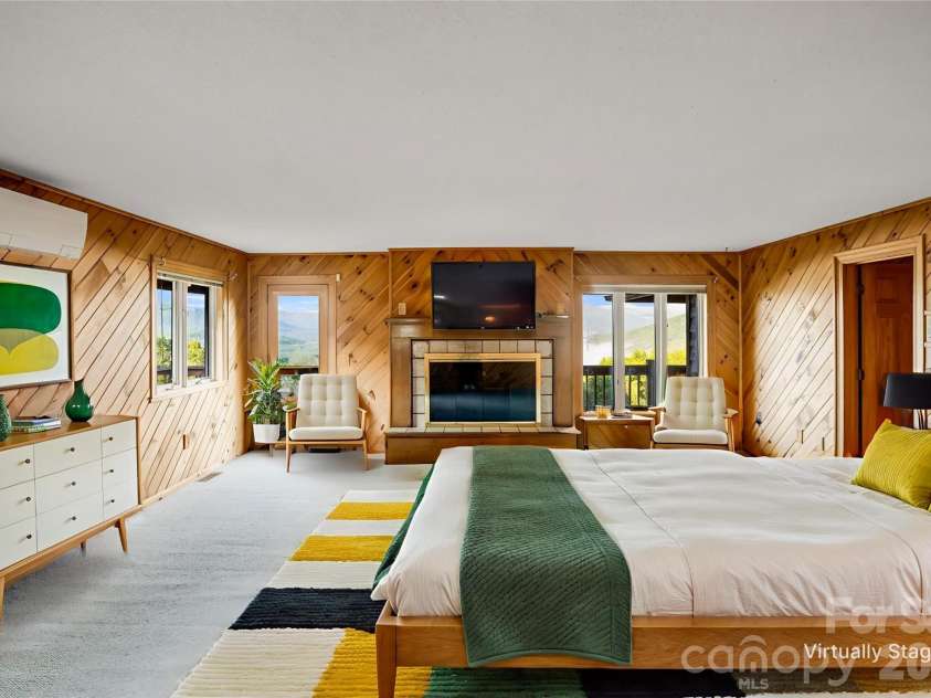 1087 Brigadoon Drive, Clyde, NC 28721.  MLS# CAR4362911, YatesRealty ID 6781. Virtually staged primary bedroom