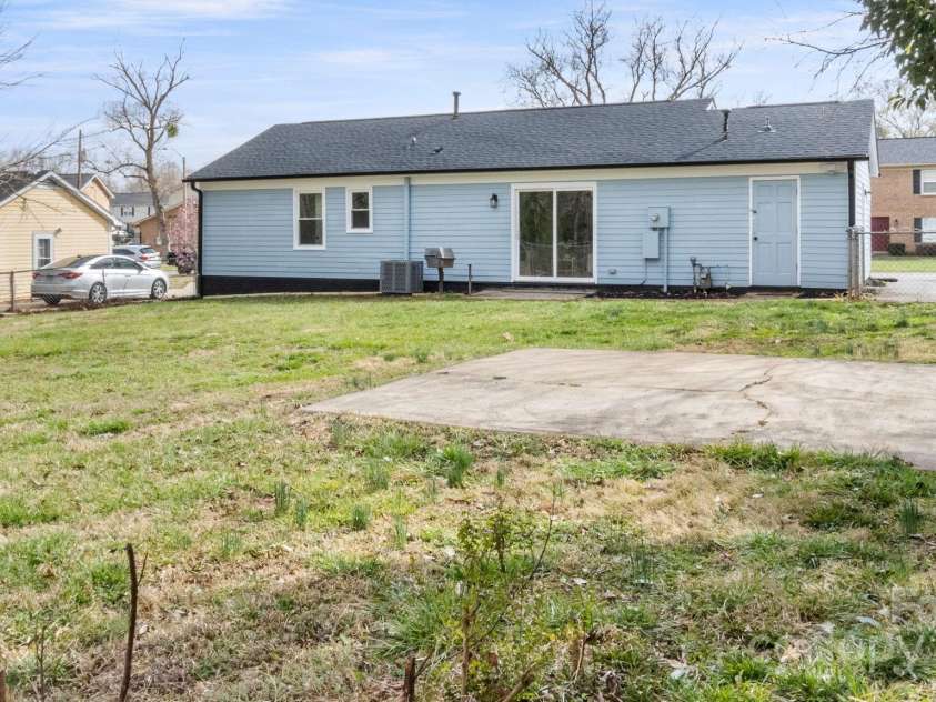 2509 Lanecrest Drive, Charlotte, NC 28215.  MLS# CAR4228955, YatesRealty ID 6783. Large fenced backyard with storage room