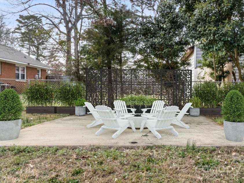 2509 Lanecrest Drive, Charlotte, NC 28215.  MLS# CAR4228955, YatesRealty ID 6783. Virtually staged with firepit and chairs