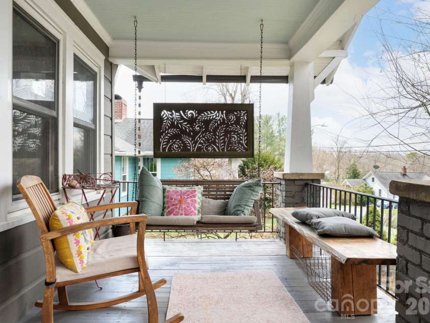 21 Craig Circle, Asheville, NC 28805.  MLS# CAR4359482, YatesRealty ID 6791. Swinging Bench and Bead Board Ceiling
