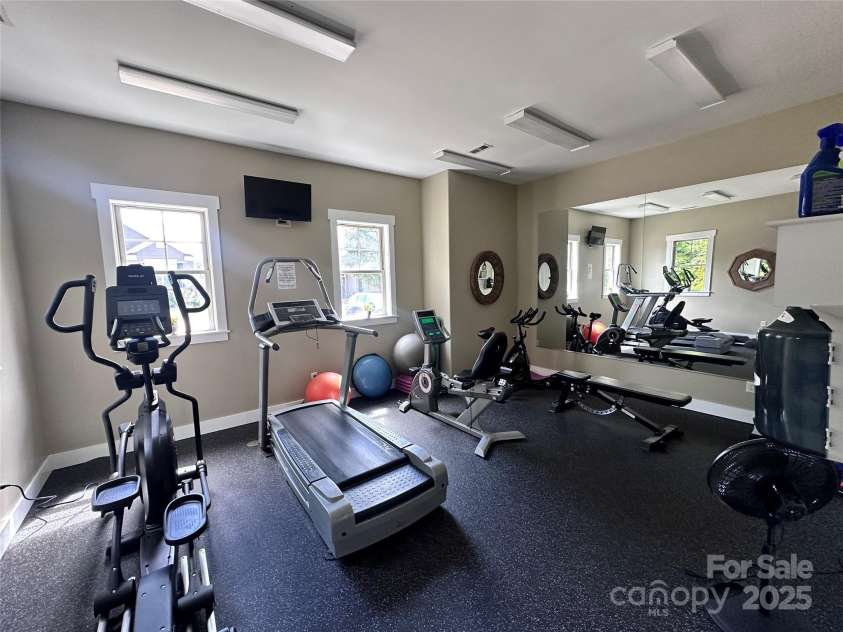 8 Southern Way Lane, Leicester, NC 28748.  MLS# CAR4226748, YatesRealty ID 6792. Brand new floor in the gym!