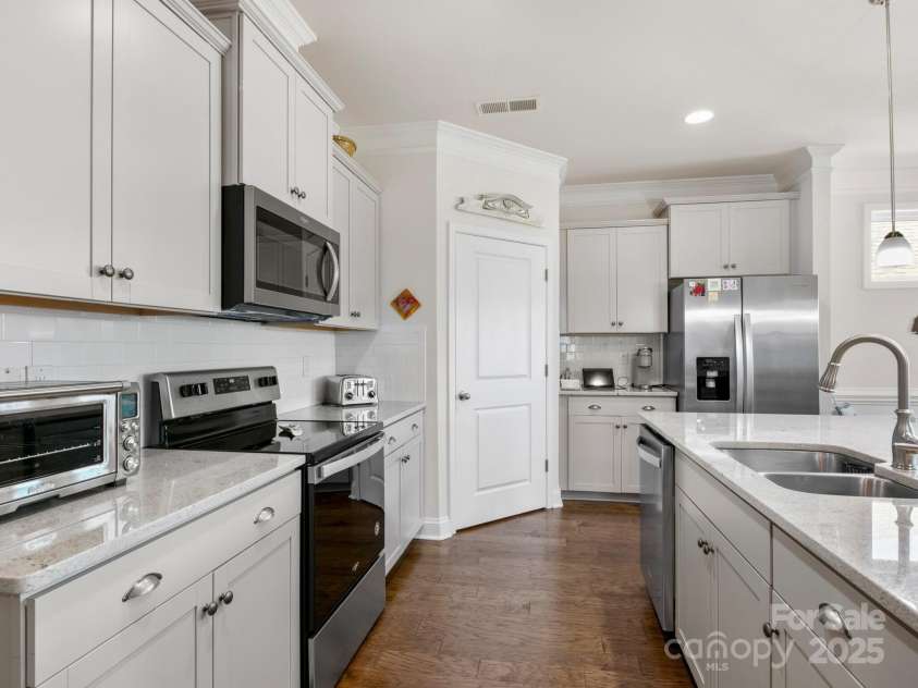 8 Southern Way Lane, Leicester, NC 28748.  MLS# CAR4226748, YatesRealty ID 6792. Pristine Kitchen with Island