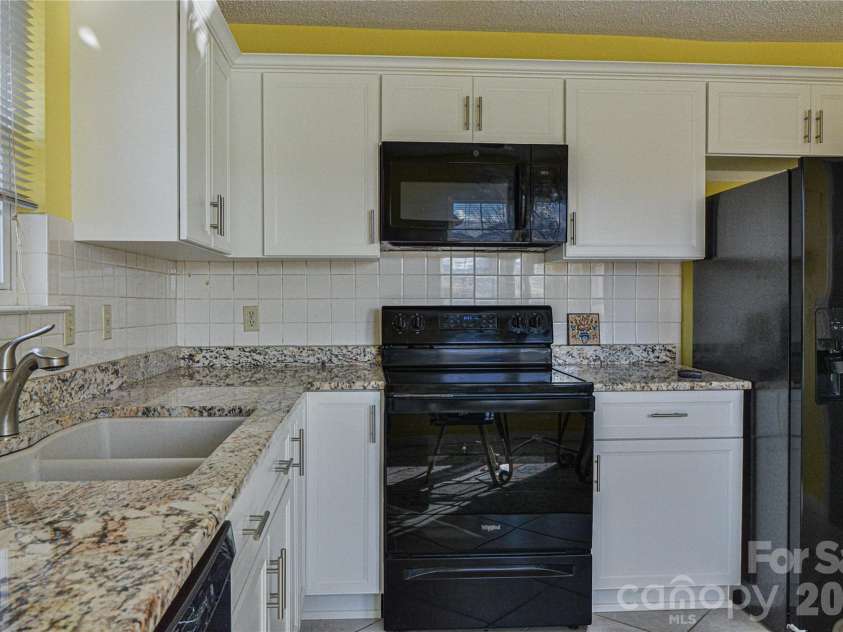 1301 Hyde Park Drive, Asheville, NC 28806.  MLS# CAR4336141, YatesRealty ID 6793. A professional look and plenty convenient