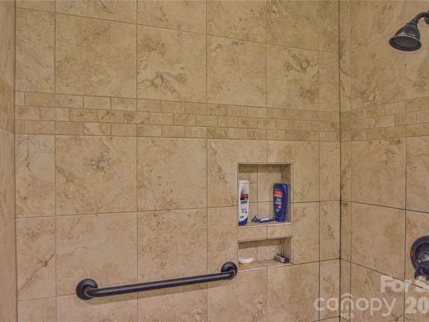 1301 Hyde Park Drive, Asheville, NC 28806.  MLS# CAR4336141, YatesRealty ID 6793. Easy-clean tile design for living