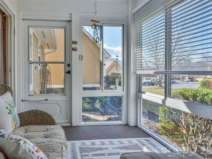 1301 Hyde Park Drive, Asheville, NC 28806.  MLS# CAR4336141, YatesRealty ID 6793. Sun porch with a view. 