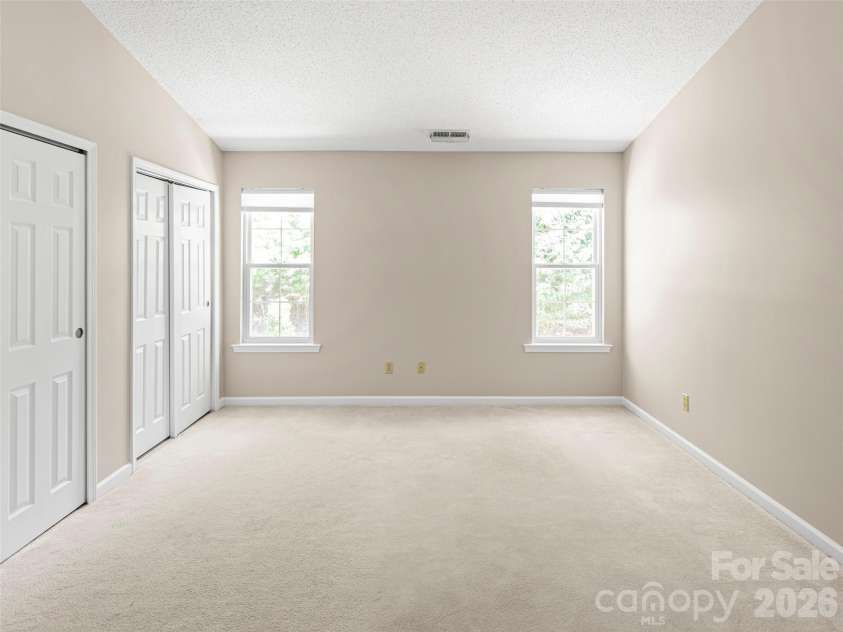 1301 Hyde Park Drive, Asheville, NC 28806.  MLS# CAR4399054, YatesRealty ID 6793. Primary Bedroom w 2 closets