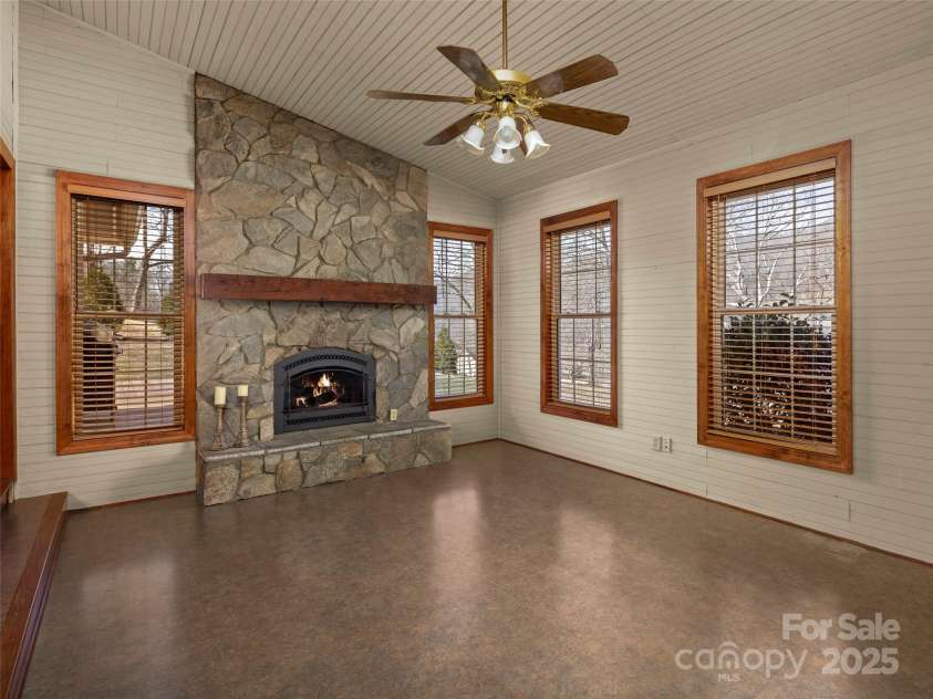 609 Fork Road, Black Mountain, NC 28711.  MLS# CAR4232280, YatesRealty ID 6793. Cozy den with gas log fireplace