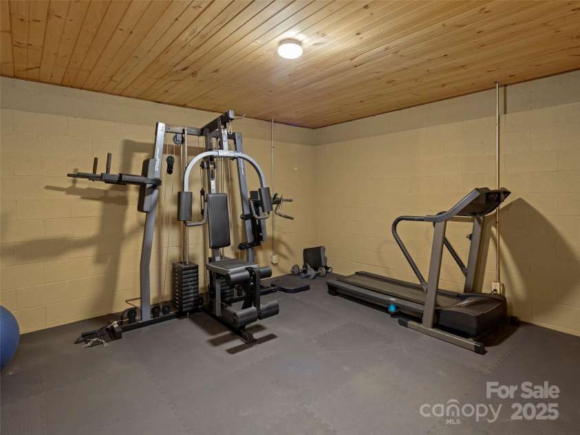 609 Fork Road, Black Mountain, NC 28711.  MLS# CAR4232280, YatesRealty ID 6793. Workout room in basement