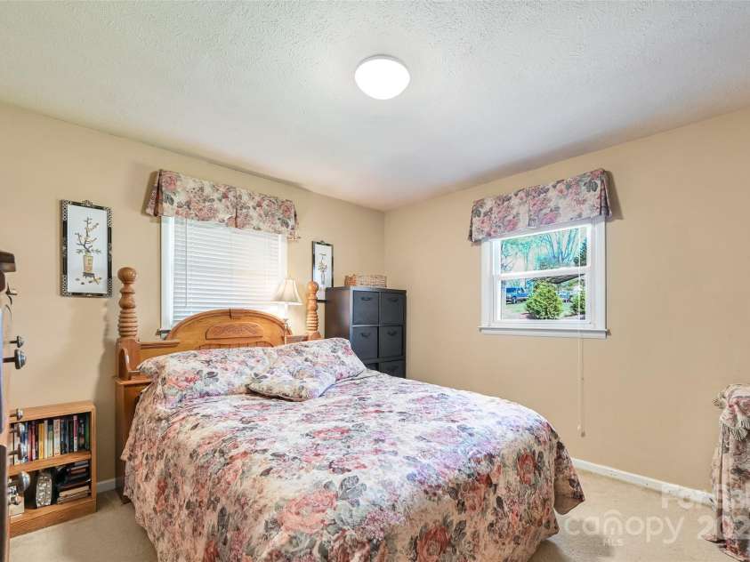 29 Delta Drive, Hendersonville, NC 28792.  MLS# CAR4243212, YatesRealty ID 6806. Main home bedrooom one