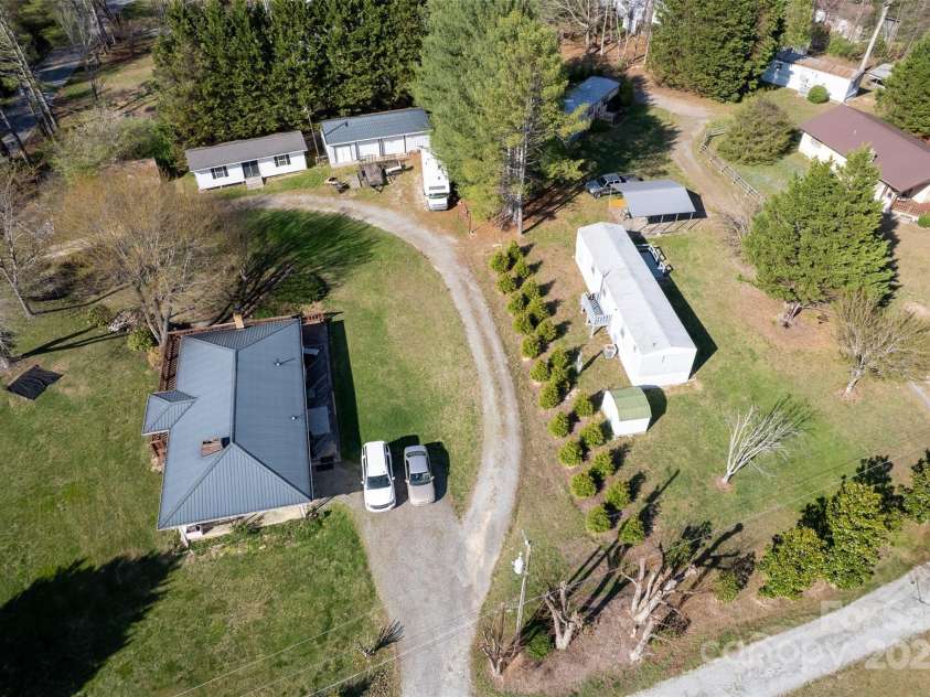 29 Delta Drive, Hendersonville, NC 28792.  MLS# CAR4243212, YatesRealty ID 6806. Main home with 4 rentals