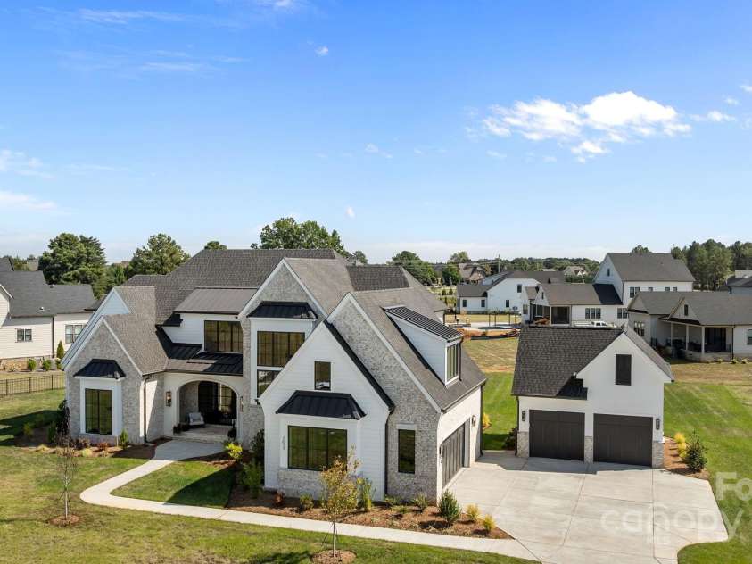 1017 Broadmoor Drive, Marvin, NC 28173.  MLS# CAR4222210, YatesRealty ID 6808. Custom home with 4 car garage