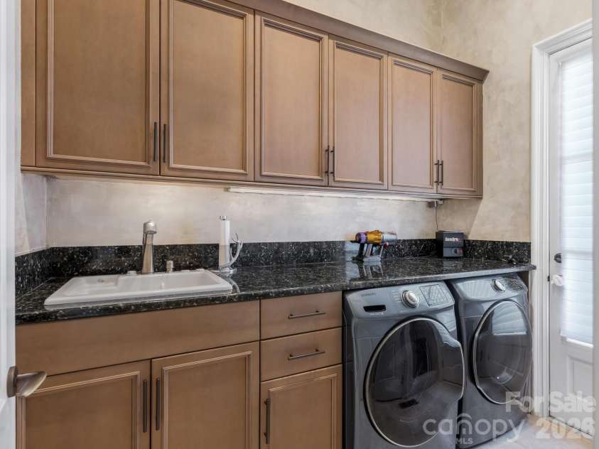 8524 Winged Bourne Road, Charlotte, NC 28210.  MLS# CAR4358780, YatesRealty ID 6808. Laundry Room 