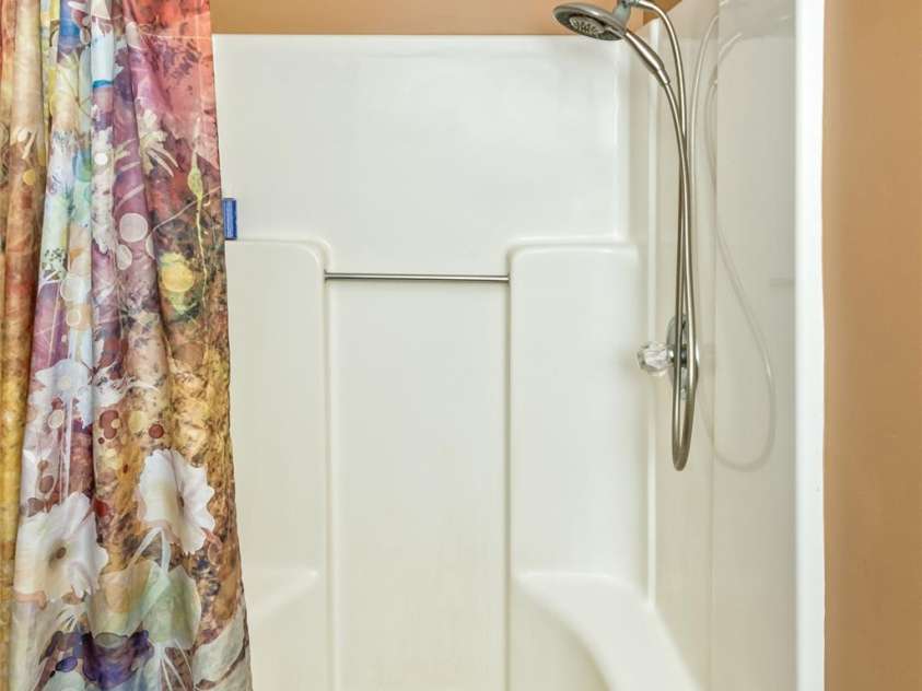 183 Stoney Fork Road, Barnardsville, NC 28709.  MLS# CAR4213332, YatesRealty ID 6809. Shower in the 2nd bathroom