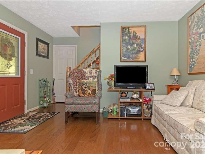 612 Old Home Place Road, Tuckasegee, NC 28783.  MLS# CAR4300096, YatesRealty ID 681. Hardwoods