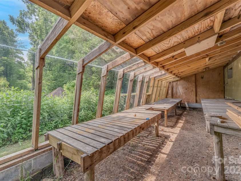8749 Nc 63 Highway, Leicester, NC 28748.  MLS# CAR4214996, YatesRealty ID 681. 4 car garage