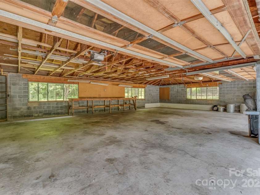 8749 Nc 63 Highway, Leicester, NC 28748.  MLS# CAR4214996, YatesRealty ID 681. 4 car garage