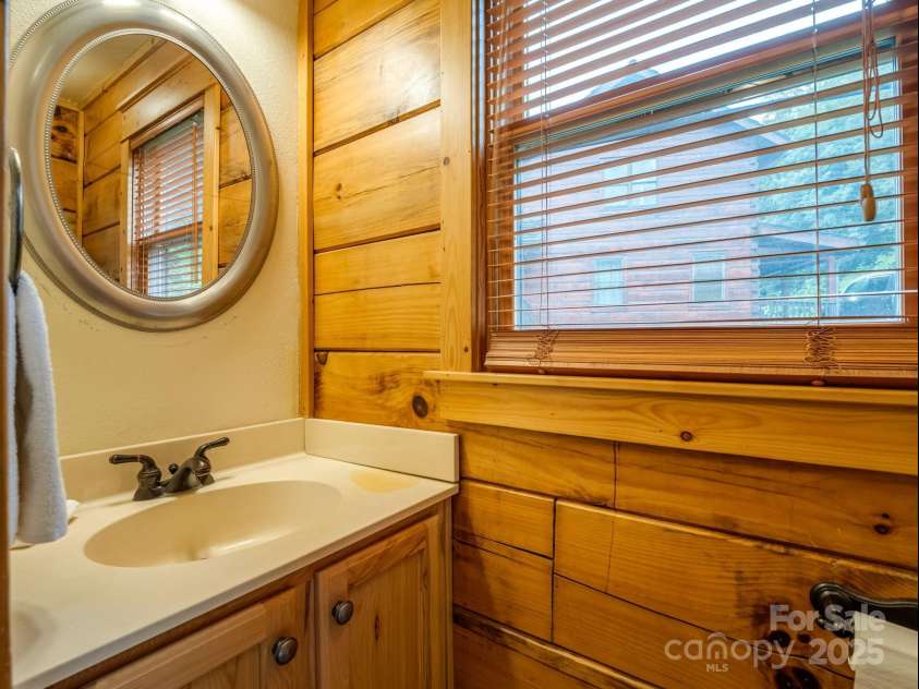 161 Scenic Wolf Drive, Mars Hill, NC 28754.  MLS# CAR4296780, YatesRealty ID 6814. Main floor half bath