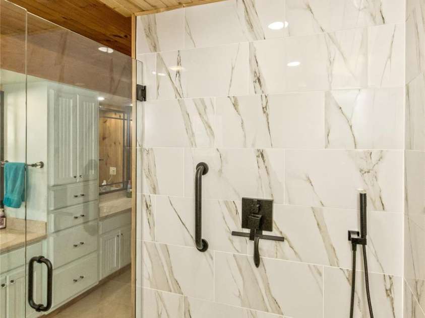 164 Tall Oaks Drive, Maggie Valley, NC 28751.  MLS# CAR4344503, YatesRealty ID 6816. Rain designed shower head.