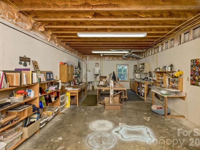 164 Tall Oaks Drive, Maggie Valley, NC 28751.  MLS# CAR4344503, YatesRealty ID 6816. Storage, workshop, or ready for expansion.