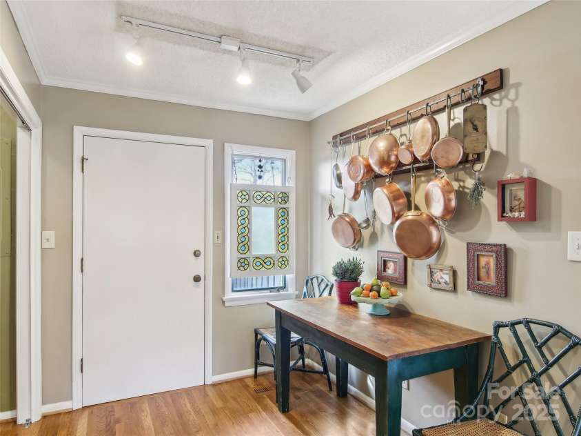 502 Crowfields Lane, Asheville, NC 28803.  MLS# CAR4239571, YatesRealty ID 6818. Breakfast nook laundry closet & front utility area access