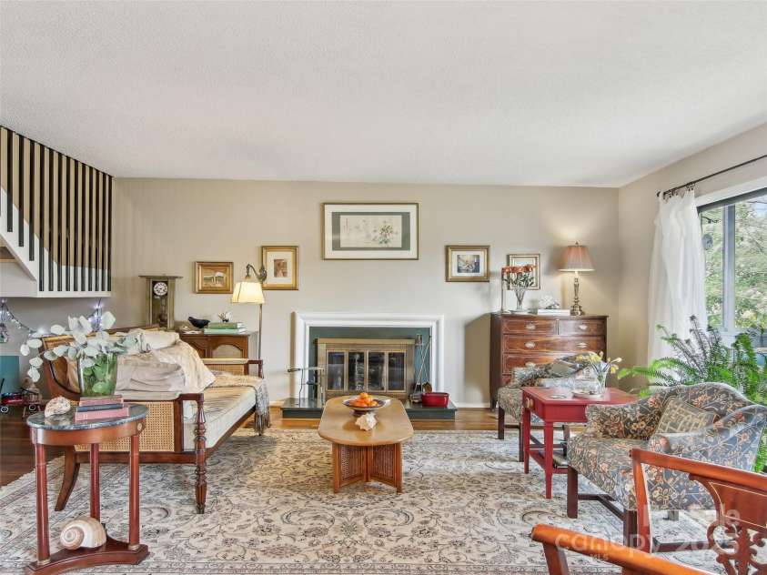 502 Crowfields Lane, Asheville, NC 28803.  MLS# CAR4239571, YatesRealty ID 6818. Coveted fireplace