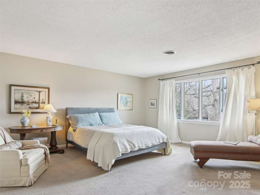 502 Crowfields Lane, Asheville, NC 28803.  MLS# CAR4239571, YatesRealty ID 6818. Gorgeous light filled primary suite