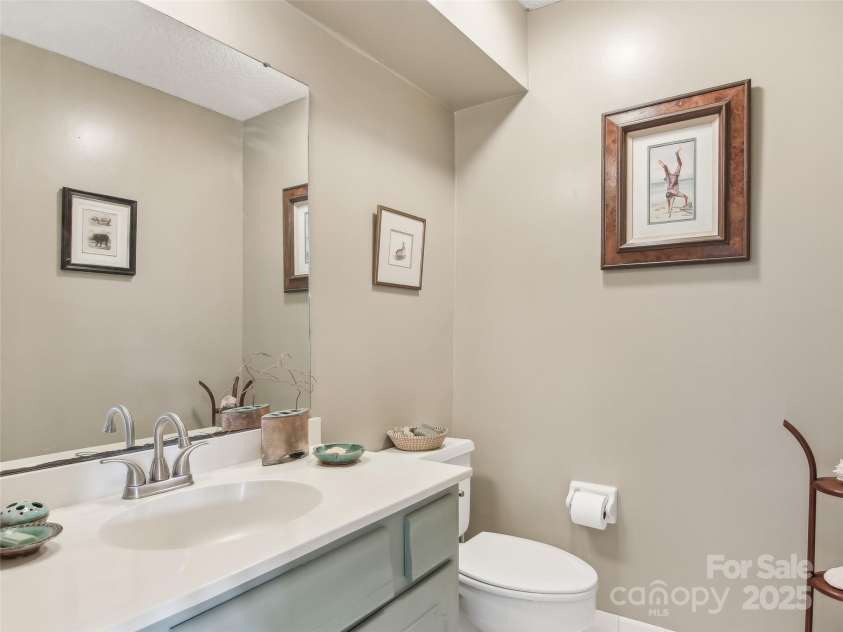 502 Crowfields Lane, Asheville, NC 28803.  MLS# CAR4239571, YatesRealty ID 6818. Main level powder room