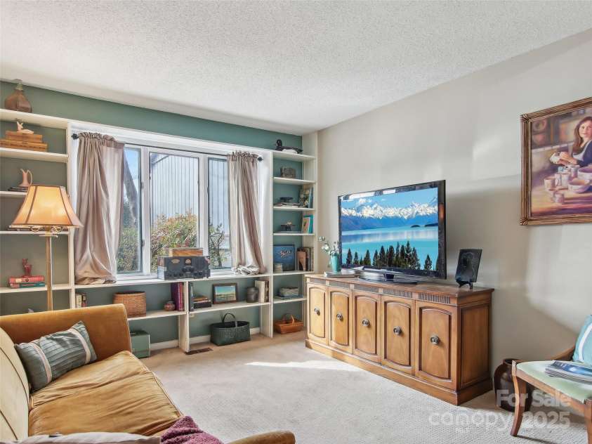 502 Crowfields Lane, Asheville, NC 28803.  MLS# CAR4239571, YatesRealty ID 6818. Main level room easily converts to bedroom use