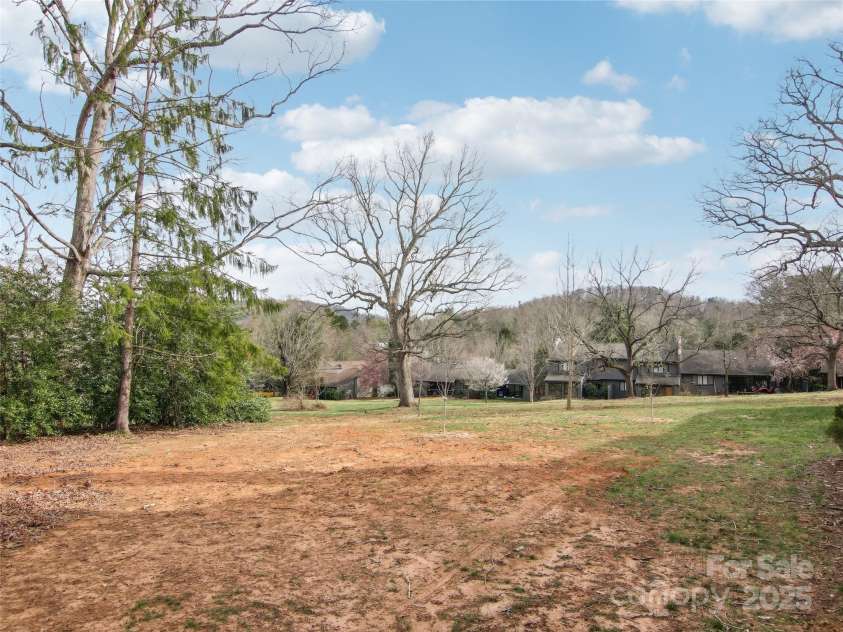 502 Crowfields Lane, Asheville, NC 28803.  MLS# CAR4239571, YatesRealty ID 6818. Mountain views and grounds that will soon be green again!