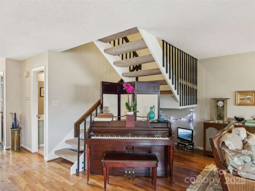 502 Crowfields Lane, Asheville, NC 28803.  MLS# CAR4239571, YatesRealty ID 6818. Open design adds to the spacious feel