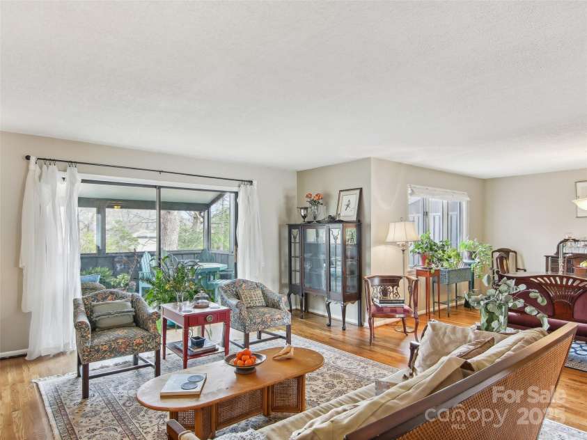 502 Crowfields Lane, Asheville, NC 28803.  MLS# CAR4239571, YatesRealty ID 6818. Open living and dining areas