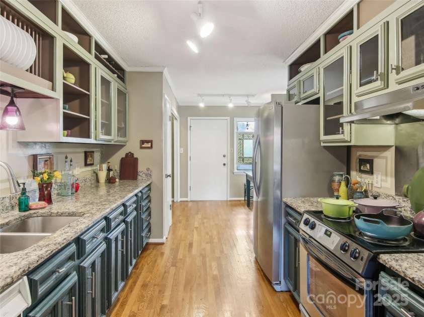 502 Crowfields Lane, Asheville, NC 28803.  MLS# CAR4239571, YatesRealty ID 6818. Such pretty floors and great layout