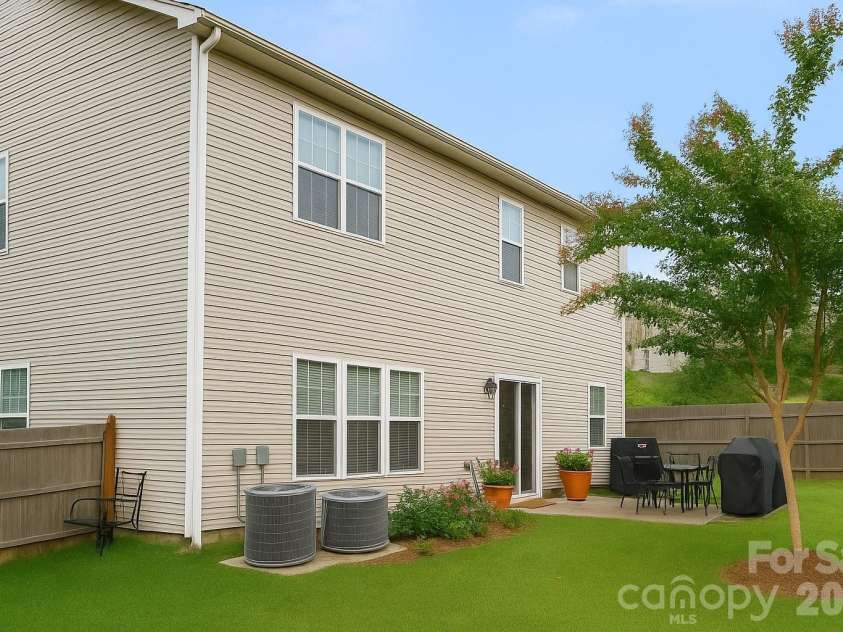 6639 Ruth Ferrell Court, Charlotte, NC 28269.  MLS# CAR4308436, YatesRealty ID 6818. Exterior back 